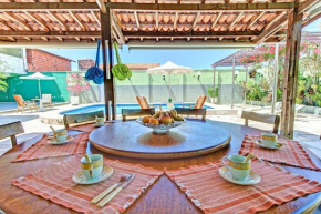 Casa das Andorinhas com piscina na praia do Iguape 50m do mar por Carpediem